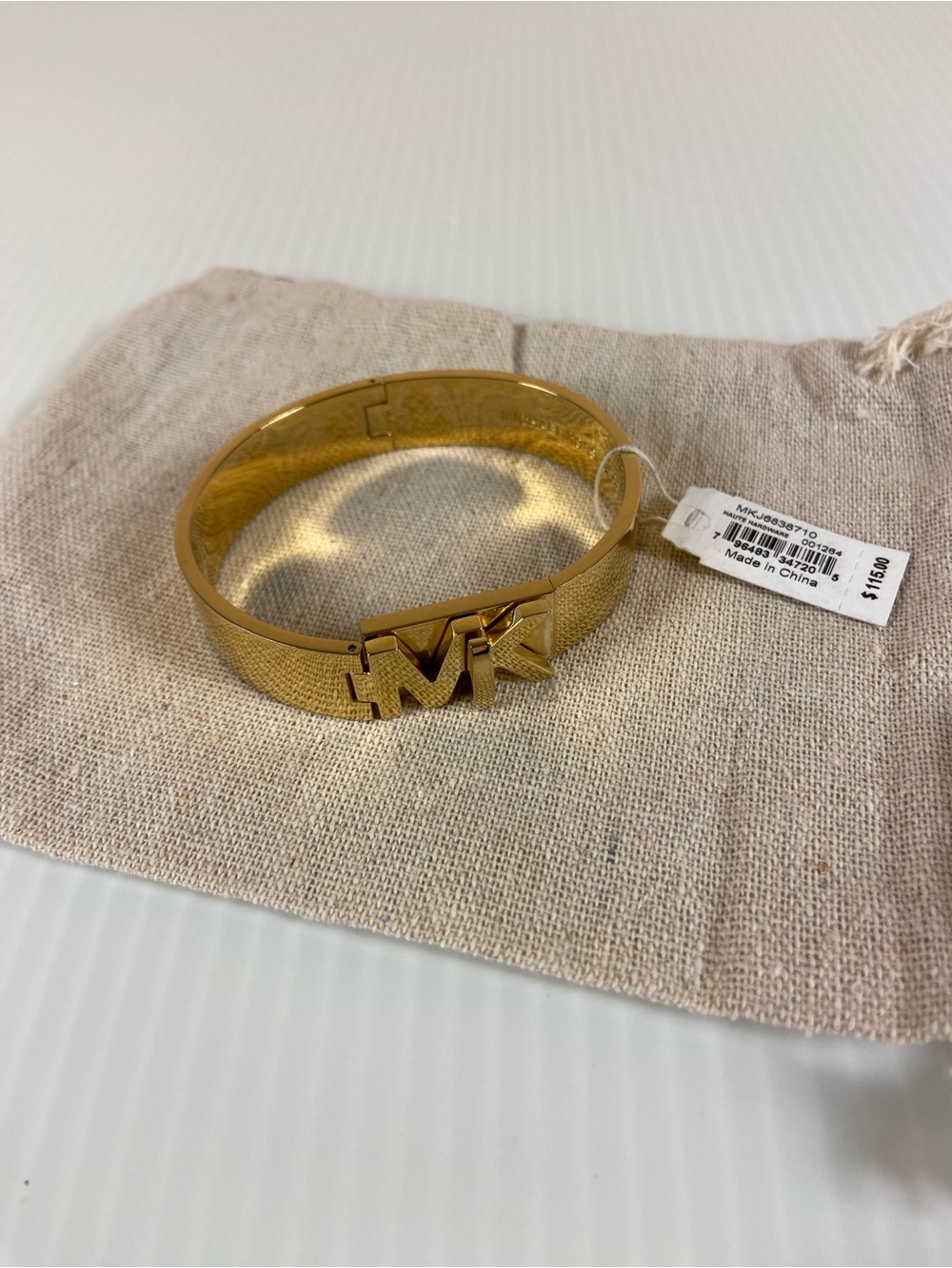 Michael Kors Gold Tone MK Logo Hinged Bangle Bracelet NWT